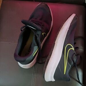 Nike Black and Yellow Sneakers with Striking Swoosh.Boys Or Girls